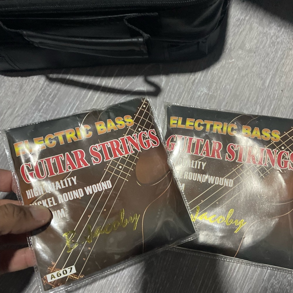 Electric bass string sets 2 packs new